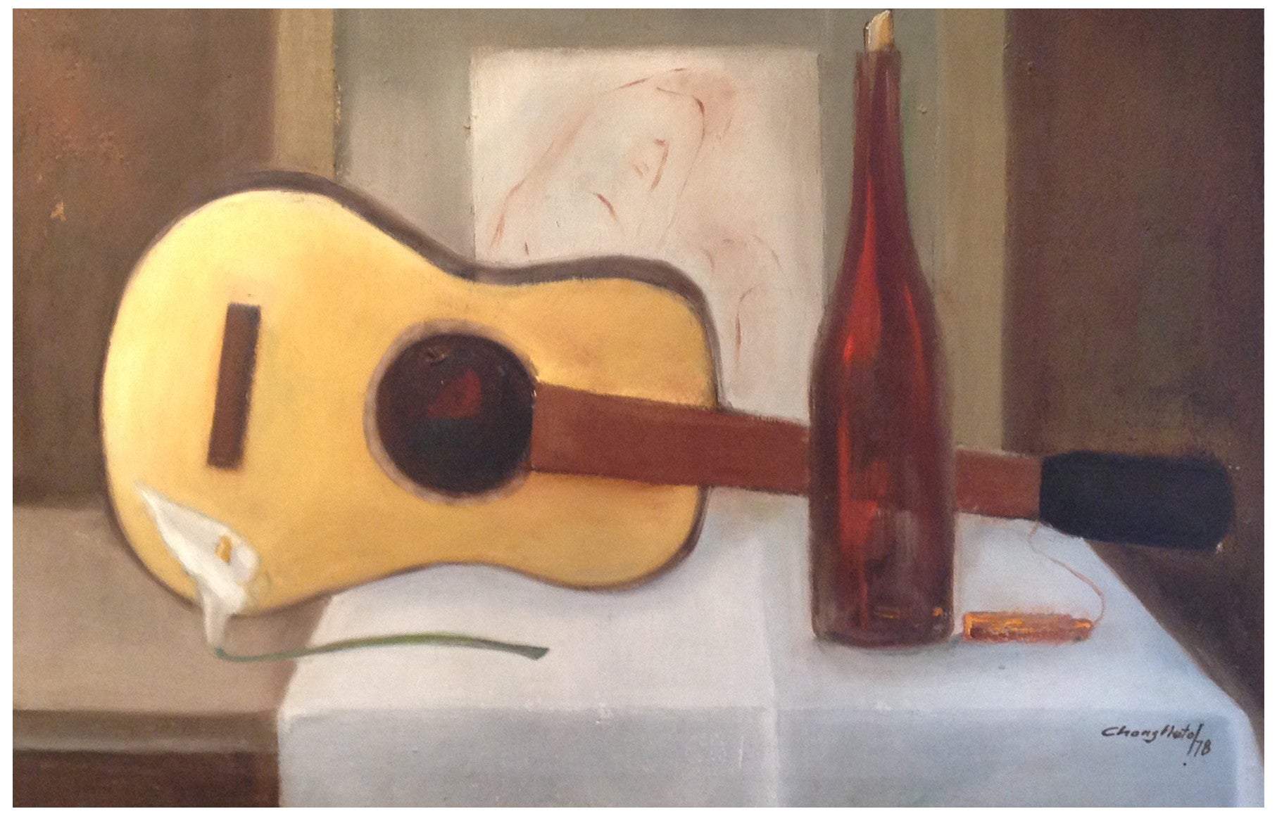 Still life with guitar and bottle
