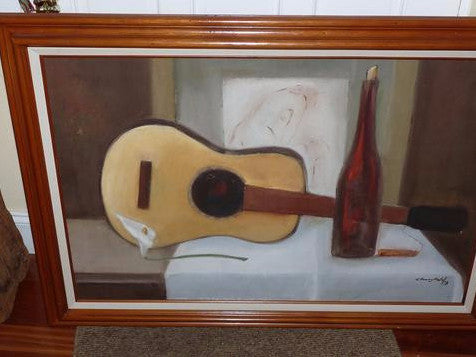 Still life with guitar and bottle